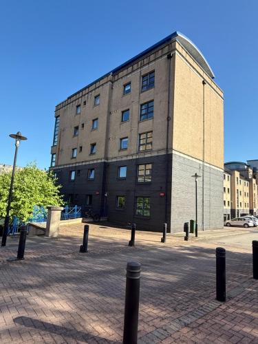 a large brick building with a lot of windows at Ferryhills Riverside Retreat in Aberdeen