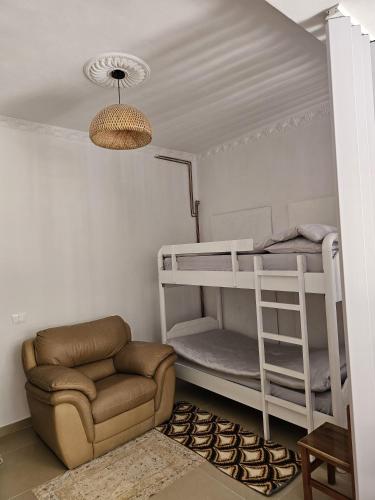 Postel nebo postele na pokoji v ubytování Green Oasis