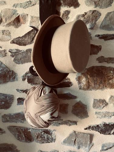 a roll of toilet paper sitting on the ground at Le vieux clos du rucher kêr-melen in Paimpol