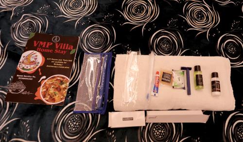 a bag of food and other items on a table at VMP Villa Home Stay in Tājganj