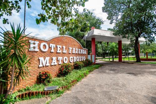 a sign for a hotel therapy melo group at Hotel Fazenda Mato Grosso in Cuiabá