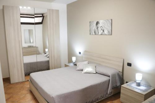Postel nebo postele na pokoji v ubytování Casa vacanza Francesca con vista mare