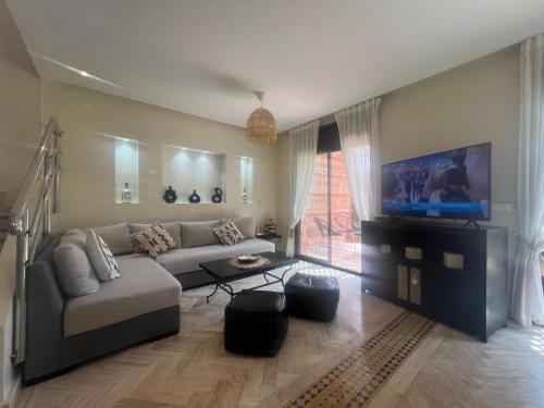 Televisyen dan/atau pusat hiburan di La Perle de Marrakech by Atlas Golf Resort