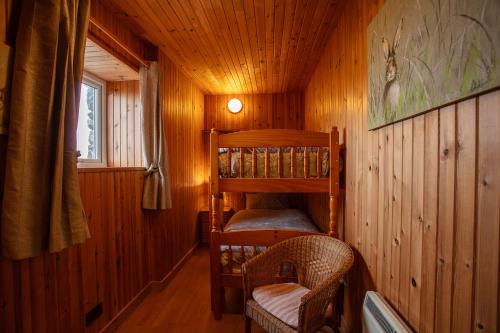 Postel nebo postele na pokoji v ubytování Kelp Cottage