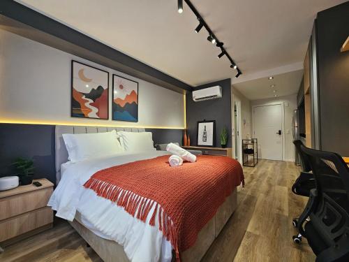 Katil atau katil-katil dalam bilik di Tempo The Arch - Bela Vista, Auxiliadora, Apartamentos em Porto Alegre