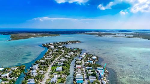 an aerial view of a resort on the beach at Into the Blues in Bay Point
