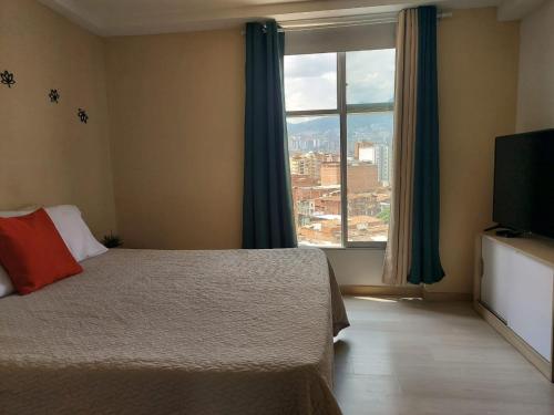Postel nebo postele na pokoji v ubytování Lovely one bedroom condo in beautiful Laureles