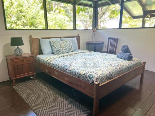 Ένα ή περισσότερα κρεβάτια σε δωμάτιο στο Delfín del Sendero