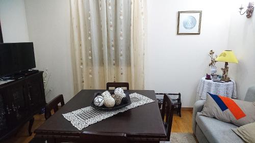 a living room with a table and a couch at Douro Valley - Casa Vale do Douro in Lamego