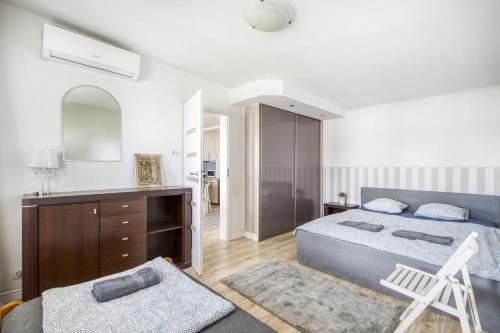 Posteľ alebo postele v izbe v ubytovaní Śliska Residence
