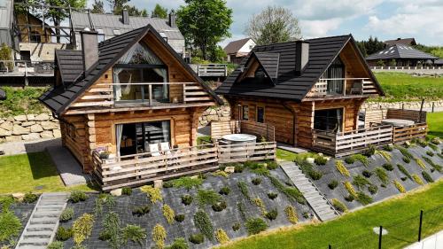 Domek z bali drewnianych w górach Jacuzzi & Balia - Osada Chełm