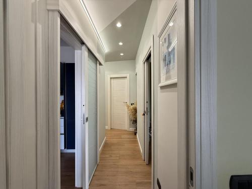 a hallway of a home with a dog standing in the doorway at Frida in San Giorgio a Cremano