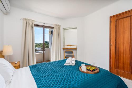 Sunny Flat with a Balcony & Pool by HostWise