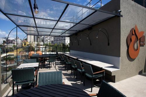 Restoran atau tempat lain untuk makan di Canto Hotel