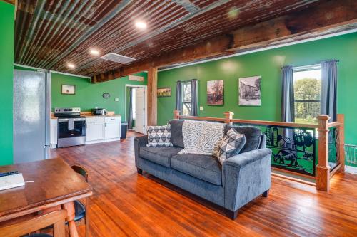 a living room with a couch and a table at Near Wineries Country Condo in New Haven in New Haven