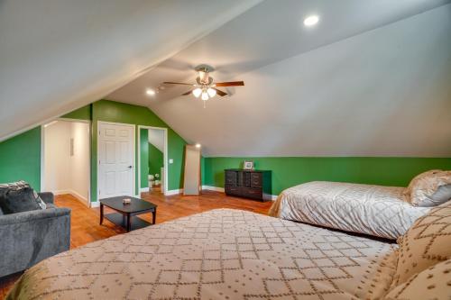 a bedroom with two beds and a ceiling fan at Near Wineries Country Condo in New Haven in New Haven