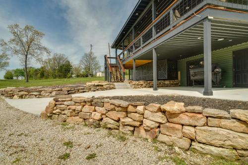 a stone retaining wall in front of a building at Near Wineries Country Condo in New Haven in New Haven
