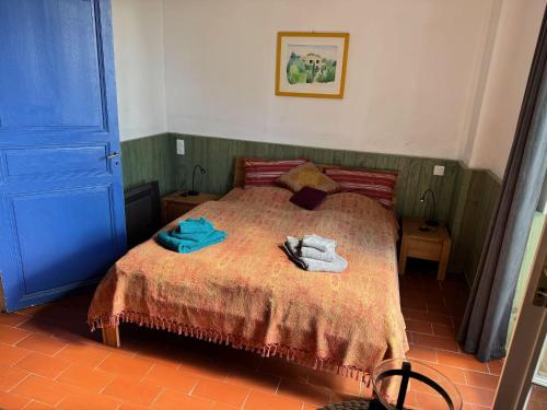 Postel nebo postele na pokoji v ubytování Maison de l´amitié Homps
