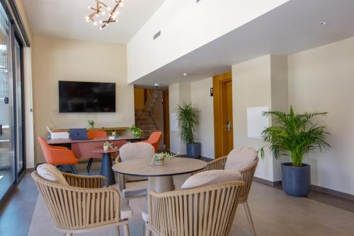 a dining room with a table and chairs at Casa Lumar Luxury Lodging- Adult Only in Fethiye