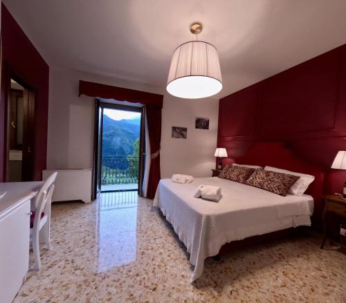 Postel nebo postele na pokoji v ubytování Reale Wine Resort