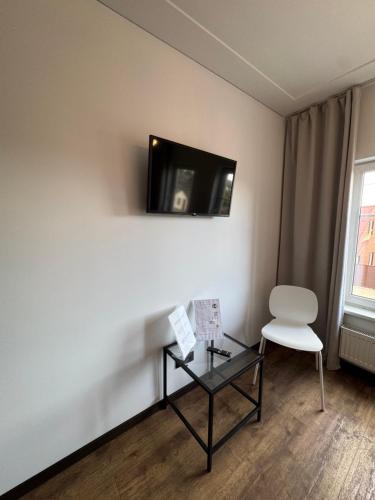 Μια τηλεόραση ή/και κέντρο ψυχαγωγίας στο Apartments in Kaunas