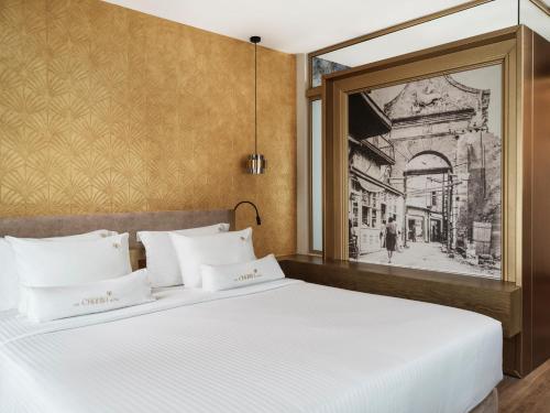 Ένα ή περισσότερα κρεβάτια σε δωμάτιο στο The Chania Hotel Crete, Vignette Collection