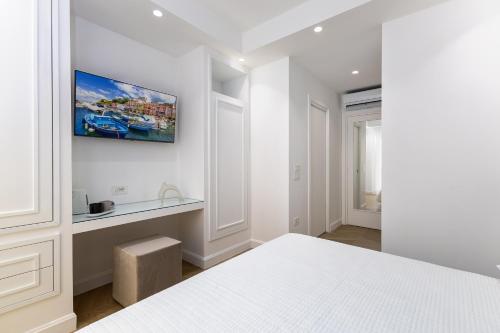 Postel nebo postele na pokoji v ubytování Maison Dorotea