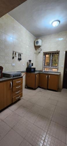Kuchyň nebo kuchyňský kout v ubytování TUT's Place 10