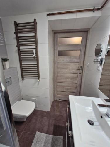 Koupelna v ubytování Apartament Z Widokiem Na Wieżę