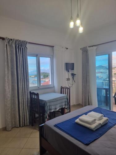 Un pat sau paturi într-o cameră la Vila Ester