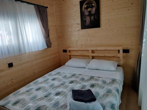 Ένα ή περισσότερα κρεβάτια σε δωμάτιο στο BayKus Guesthouse-Konukevi