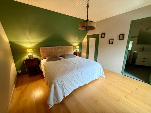 Ein Bett oder Betten in einem Zimmer der Unterkunft maison bretonne,gîte de keranglaz