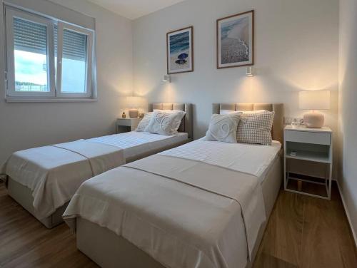 Кровать или кровати в номере SunFunApartment Croatia