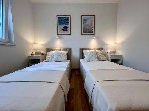 Кровать или кровати в номере SunFunApartment Croatia