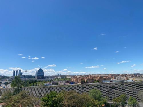 a view of the city of berlin from a building at Lujoso Loft La Moraleja in Madrid