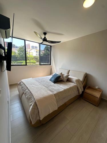 Ένα ή περισσότερα κρεβάτια σε δωμάτιο στο Luxury loft with home theater & pool, Buenavista top location