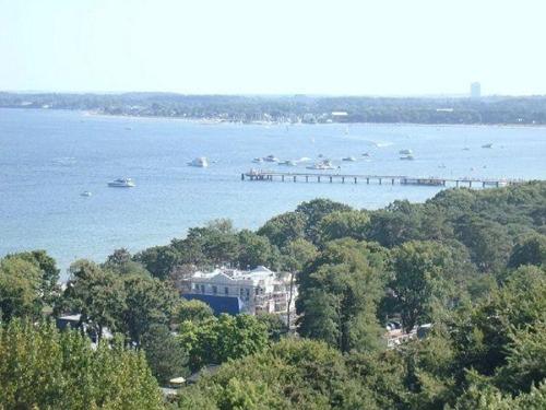a view of a large body of water with boats at Seeseite-Romantik-Apartment in Timmendorfer Strand