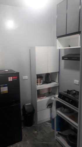 Η κουζίνα ή μικρή κουζίνα στο Richwood Homes Isugan, Bacong