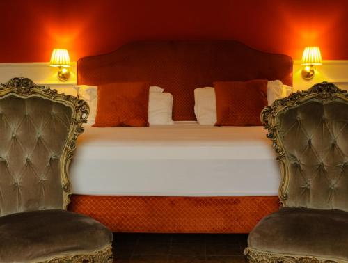 Postel nebo postele na pokoji v ubytování Putechella Retro Rooms & Villa