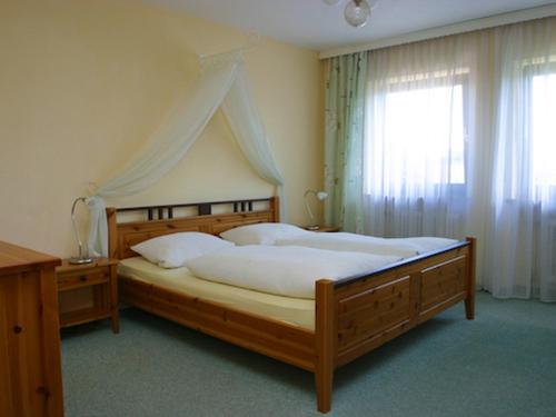 Ліжко або ліжка в номері Gästehaus Steiger