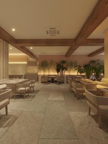 Un restaurante o sitio para comer en OZ Hotel Collection