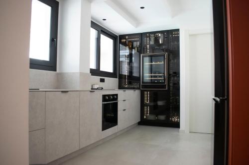 Dapur atau dapur kecil di Kalinifta Rooms Luxury Style