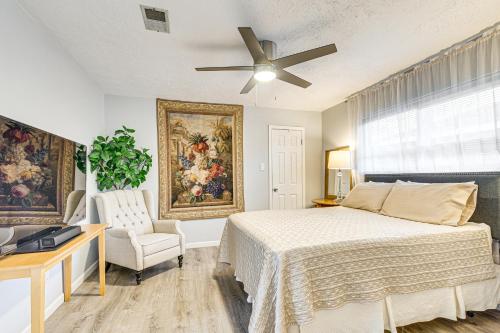 a bedroom with a bed and a ceiling fan at 6 Mi to Clear Lake Family Home with Patio and Yard in Webster