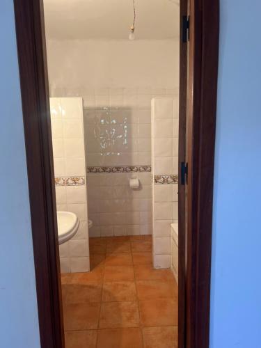 a bathroom with a toilet and a sink at CaboNegro Tetouan in Tetouan