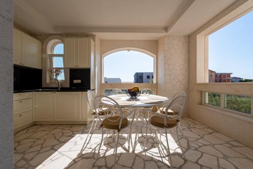 Apartments with swimming pool Novalja, Pag - 24151