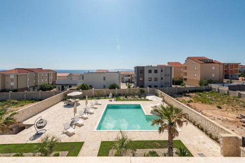 Apartments with swimming pool Novalja, Pag - 24151