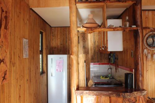 Kuchyň nebo kuchyňský kout v ubytování Refugio Pucura