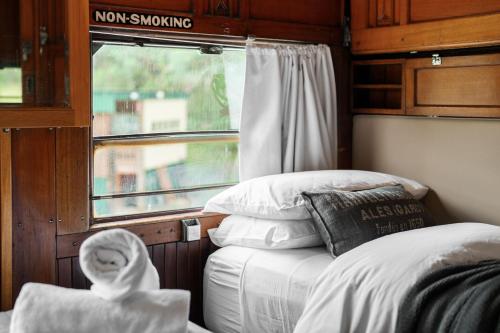 Ένα ή περισσότερα κρεβάτια σε δωμάτιο στο Angas Carriage, Alpine, Southern Highlands