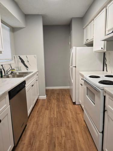 Η κουζίνα ή μικρή κουζίνα στο Cozy Condo1