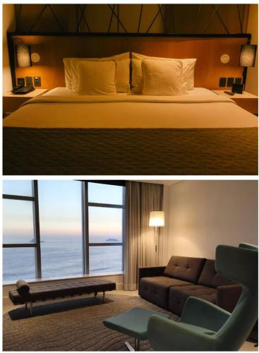 a hotel room with a bed and a couch at Hotel Nacional in Rio de Janeiro